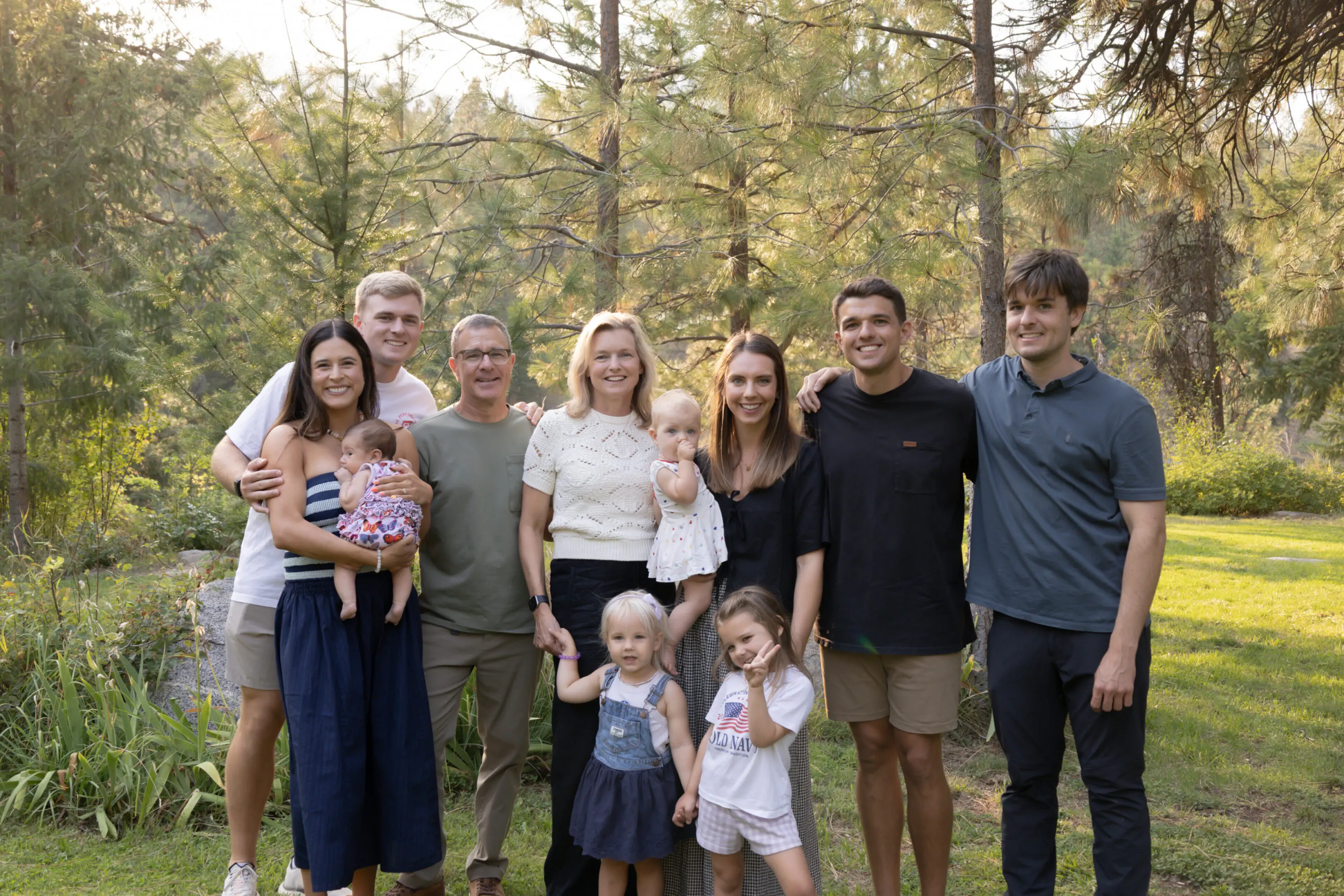 Family gathering in a natural outdoor setting.
