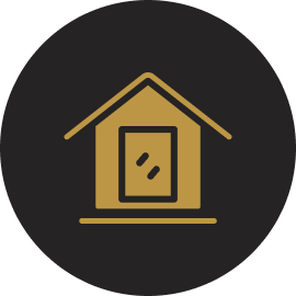 Golden house icon on dark background.